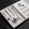 Juego de cubiertos de acero inoxidable Amazon transfronterizo, cuchillo de bistec occidental, tenedor y cuchara, mango de piel de serpiente, juego de cuatro piezas, regalo