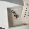 Lindo Llavero de Caricatura de Banda Capibara, Adorable Colgante de Bolsa Pequeña de Cuero con Instrumento Musical, Regalo para Parejas y Mejores Amigos