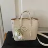 Bolso Cruzado de Hombro Tipo Cubo de Moda Exquisita Transfronterizo para Viajes de Negocios Verano 2026 Nuevo Versátil de Gama Alta Diseño de Nicho