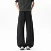 Pantalones Largos Casuales de Hombre Estilo Americano Patchwork Cuchillo Curvo Holgado Retro Bloque de Color Dividido Pierna Recta Primavera/Otoño 2026