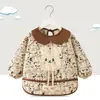 Babero de terciopelo de cristal para bebé, impermeable, antidesgaste, con bolsillo de arroz, para otoño e invierno, delantal para madre y bebé.