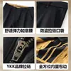 Calças retas masculinas slim fit de outono, business casual, resistentes a rugas, versáteis, com múltiplos bolsos e design oculto