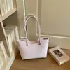 Bolso tote nuevo estilo coreano con estampado de leopardo para principios de otoño de 2026, bolso de hombro de gran capacidad para el trabajo y los desplazamientos, bolso de mano simple y único