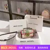 Bolso cuadrado pequeño de contraste de graffiti de moda para una generación 2024 de alta textura de lujo bolso de mensajero bolso de mano al por mayor