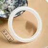 Pulseira de imitação de vidro jade branco de Xinjiang jade branco gordura de ovelha Hetian barra redonda pulseira de vidro pulseira de jade de barraca Jianghu atacado