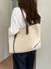Bolsa de Axila Grande Capacidade Estilo Coreano Feminina 2026 Nova Moda Bolsa Tote Tecida Personalidade Tendência Simples Bolsa de Ombro