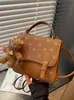 Yaozi 2026 principios de otoño nueva moda mochila simple para mujer bolsa escolar para estudiante bolso de hombro cruzado versátil y elegante
