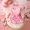 Nuevo mono de bebé transfronterizo primavera y otoño europeo y americano rojo manga larga cuadros bolsa falda de pañal ropa de Navidad para bebé niña
