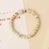 Pulseira de Cerâmica Queimada em Forno Estilo Chinês Novo de Jingdezhen com Incrustações de Madeira Natural, Pingentes de Prata Vintage, Estilo Nacional de Nicho, Exibição de Banca de Estudante