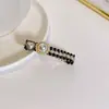 2022 Pinza para el pelo estilo Chanel Pinza de pico de pato de celebridad de Internet INS Accesorios para el pelo Hermoso pasador de perlas Pinza lateral retro
