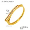 Rueda de la fortuna Europa y Estados Unidos pequeño completo de diamantes micro incrustación de circonita anillo abierto diseño de moda sensación acero inoxidable chapado en oro de 18K