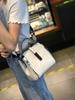 Bolso de piel auténtica para mujer, novedad de 2024, moderno y retro, bandolera de alta gama, versátil y versátil.
