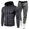 Colección Otoño/Invierno 2026: Sudadera deportiva unisex de lunares con forro polar, conjunto de sudadera con cremallera y pantalones de chándal de color liso para hombre