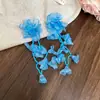 Flor de chifre com agulha de prata Flor com contas Laço de flor Brincos com borla redonda Brincos de tarraxa versáteis e elegantes Brincos de nicho de luxo leve