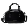 Versión coreana de popular bolsa de almohada portátil de nicho popular 2024 nueva moda casual para mujer bolso de hombro cruzado