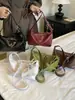 Bolso pequeño vintage de alta gama transfronterizo para mujer, nuevo bolso versátil de hombro y axila para el verano de 2026, bolso cruzado tipo dumpling