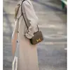 Casaco trench coat de alta qualidade com caimento fluido, estilo coreano, jaqueta cáqui, modelo feminino da primavera de 2026, roupas femininas de comprimento médio, estilo coreano