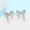 Brincos de Tarraxa com Laço de Zircônia Pérola Luxo Leve Sensação de Alto Padrão Moda Versátil Design de Brinco Simples Brinco de Temperamento