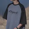 Camiseta Fashion Tendência Casal 2023 Marca Estilo Americano Camurça Manga Raglan Solta Manga Curta Jovens Homens e Mulheres
