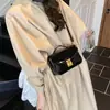 Bolso de Color Sólido Nuevo 2025 Versátil Moda Bolso de Mano para Viajar Bolso de Hombro Cruzado de Moda de Gama Alta Bolso de Mujer de Moda