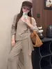 Conjunto de tres piezas para mujer estilo coreano: cárdigan de manga larga + chaleco + pantalones acampanados cortos, nuevo conjunto holgado adelgazante otoño 2026
