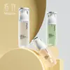 Botella de loción personalizada de 80 ml, botella portátil recargable, botella con atomizador, botella con atomizador de alcohol, botella vacía de muestra de base de maquillaje