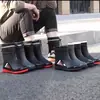Botas de lluvia para hombre de media pantorrilla antideslizantes impermeables zapatos nueva moda exterior cerradas botas de agua cálidas zapatos cortos de goma hombre venta al por mayor
