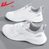 Zapatos de hombre Warrior, zapatos transpirables de primavera, nuevas zapatillas de correr para hombre 2026, versátiles, ligeros, zapatillas deportivas de punto volador con suela blanda para hombre