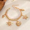 Tornozeleiras de Pérola Atacado Estilo Férias Europeu e Americano Cruzado Pingentes de Tartaruga, Estrela do Mar, Concha Tornozeleiras Femininas com Design em Camadas