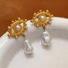 2025 Nuevo Diseño Pendientes de Ojo Incrustados con Perlas Pendientes de Acero Inoxidable Set de Pendientes Joyería de Lujo Ligero de Alta Gama