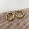 Pendientes Redondos de Aguja Plateada Simples Exquisitos Lujo Ligero Pendientes de Botón de Gama Alta Moda Versátiles para el Trabajo Accesorios para Mujer Venta al por Mayor