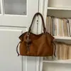 Bolsa tote feminina de nicho fashion, bolsa de ombro simples de grande capacidade para outono e inverno, bolsa para trabalho e deslocamento, bolsa de axila, bolsa de mão