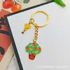 Llavero Colgante Año Nuevo 2026 Metal Zodiaco León Dorado Petardo Despertar Bolsa de la Fortuna Colgante Evento Pequeño Regalo