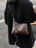 Bolso Retro Tipo Dumpling para Mujer Otoño e Invierno 2026 Nuevo Casual Versátil Cruzado Bolso de Mano Pequeño de Alta Gama Moderno