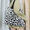 2023 Nova bolsa ins especial transfronteiriça bolsa de tricô bolsa de ombro com estampa de leopardo bolsa de mão bolsa tote de grande capacidade