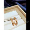 Pendientes de Falda Pequeña Baojia para Mujer Plata de Ley Malaquita Natural Forma de Abanico Incrustados con Diamantes Pendientes Populares de Abanico Otoño e Invierno Completamente Incrustados de Diamantes