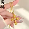 Collar con colgante de cruz de llama chapado en oro estilo joyería, cadena para la clavícula de nicho de lujo ligero de alta gama para mujer
