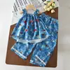Nuevo Conjunto de Verano para Niñas Estilo Coreano Top con Tirantes Florales y Lazo y Pantalones de Pierna Ancha Conjunto de Dos Piezas Ropa Infantil de Moda