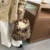 2026 Outono e Inverno Novo Estilo Coreano Peludo Estampa de Leopardo Gatinho Infantil Mochila Bolsa Pai e Filho Estudante Atacado