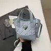 Bolsa de mão tipo balde com bordado matelassê 2026 nova versátil elegante bolsa de ombro comércio exterior popular bolsa transversal de alta qualidade