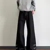 Jeans de diseño negro retro americano, unisex, corte holgado, estilo casual, con un ajuste limpio y corte recto de pierna ancha