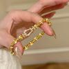 Pulsera de Cuerda Elástica de Estilo Francés Retro con Ojo de Gato Incrustado de Diamantes y Hebilla de Herradura para Mujer, Estilo Antiguo Medio Nicho de Alta Gama