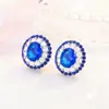 Venta en vivo de una generación de pendientes de diamantes azules tesoro llenos de diamantes pendientes de lujo Red roja con pendientes de zafiro anillo