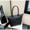 Bolsa de Hombro Directa de Fábrica Gran Capacidad para Mujer Bolso de Mano para Viajes Cotidianos Bolso de Hombro Simple Moderno