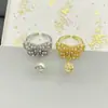 Nuevos Pendientes Retro de Mariposa Hueca Dior para Mujer Primavera Temprana 2025 con Agujas de Plata y Pendientes de Perlas Cd Venta al por Mayor