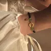 Hotan Fuyu Donut Hebilla de Seguridad Marca Fufu Cuerda de Mano Tejida Pulsera para Pareja Hombre y Mujer Regalo para Novia Estudiante
