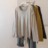 Novo suéter feminino oversized estilo coreano com gola redonda, barra desfiada, caimento solto e design assimétrico, criando um efeito relaxado e emagrecedor.