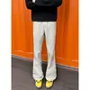 Pantalones de hombre de venta caliente transfronteriza estilo coreano pantalones de pierna ligeramente acampanada pantalones casuales para hombre color liso simple versátiles pantalones de talla grande