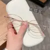 Nuevos Marcos de Lentes de Titanio de Gama Alta Estilo Puro Deseo Ovalados Pequeños Vintage de Celebridad de Internet de Moda al por Mayor, Adecuados para Lentes de Graduación