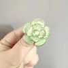 Broche Exquisito de Alta Calidad Piedra Ojo de Gato Camelia nuevo accesorio para traje de suéter broche de solapa estilo pequeño fragante corsage para mujer